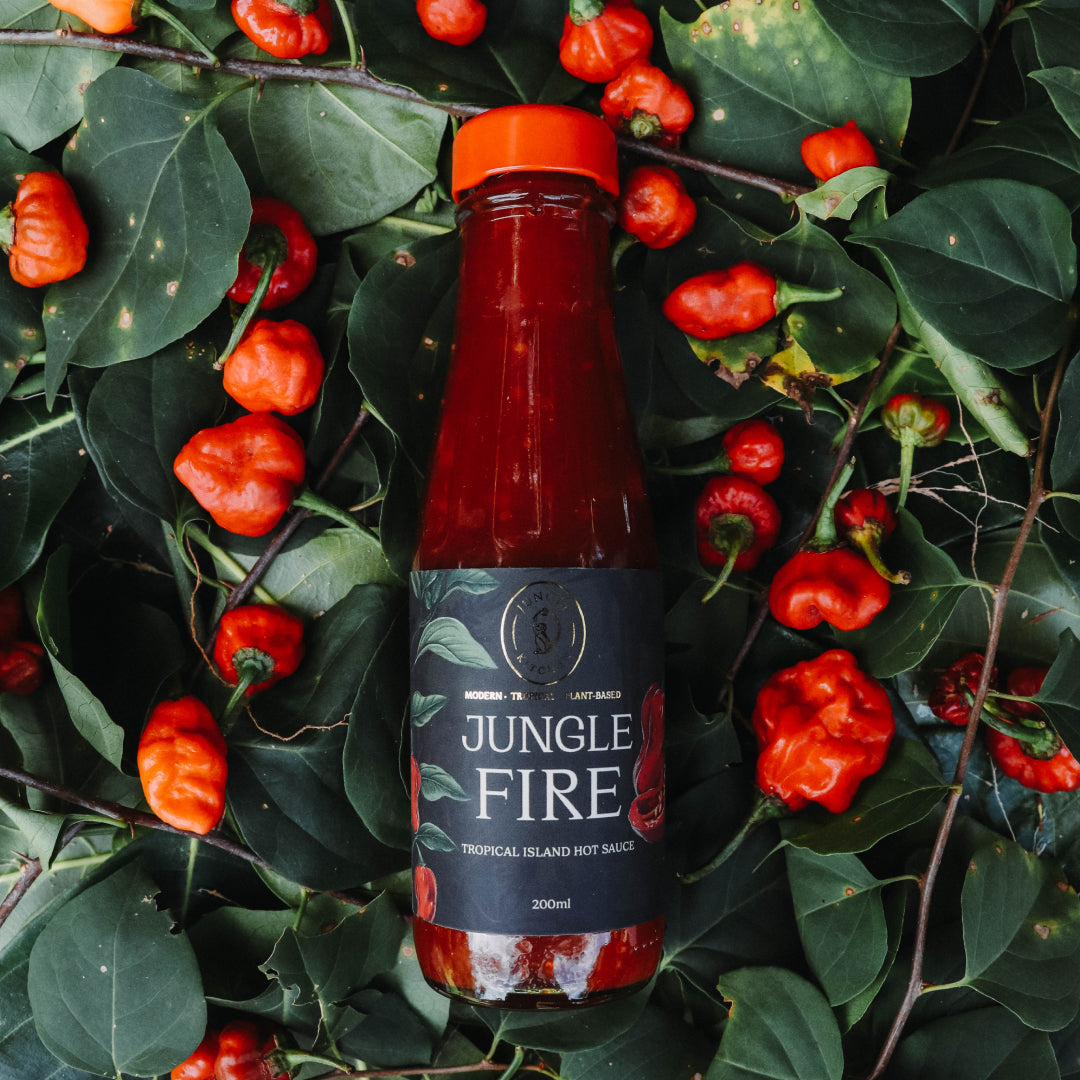 Experience an explosion of flavor with Jungle Fire Hot Sauce, made with exotic Cobra Chilli (Nai Miris). This sweet yet spicy sauce enhances everything from chips to cocktails. Elevate your dishes with the perfect balance of heat and flavor. Discover the intoxicating taste of Jungle Fire Hot Sauce today!